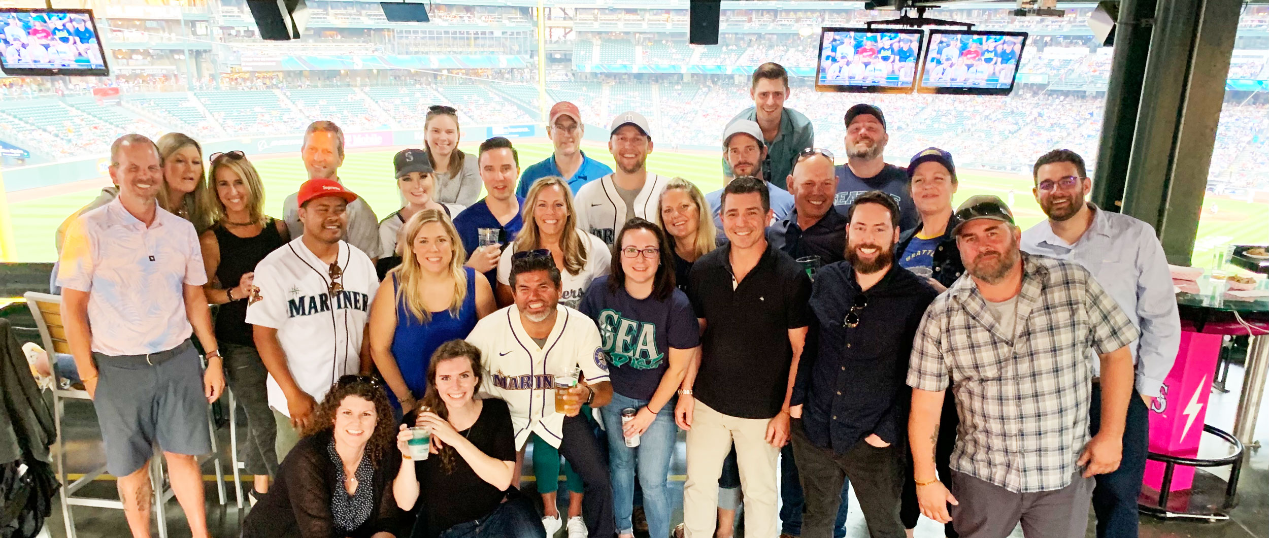 picture of the team at a baseball game