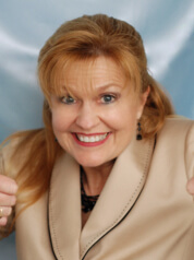 Annette M funny photo (she has a big smile with thumbs up)