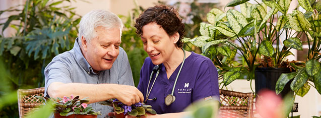 man and woman smiling