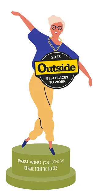 Woman celebrating on trophy labeled "Outside Best Places to Work" by East West Partners