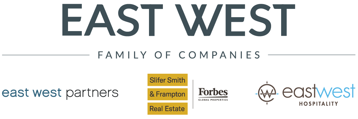 East West Family of Companies logo