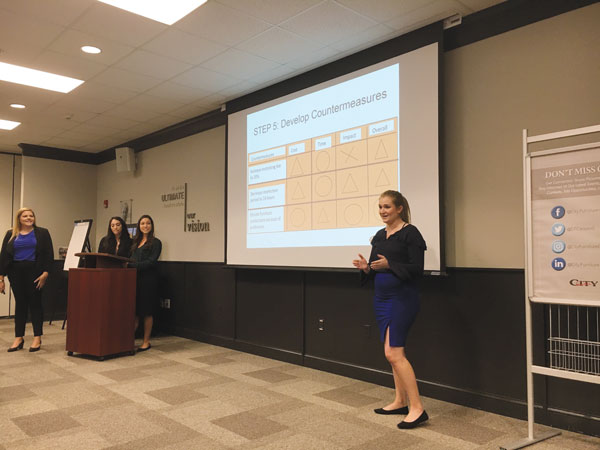 Interns making a presentation