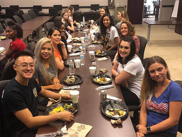 picturer of interns eating lunch