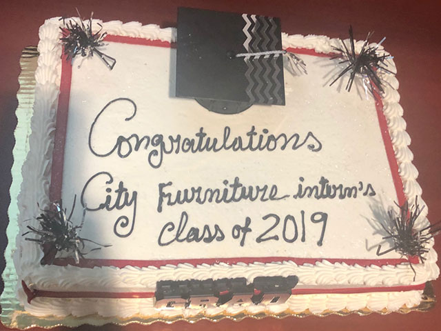 Picture of cake congratulating the interns