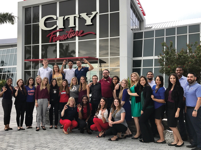 Picture of interns in front of headquarters