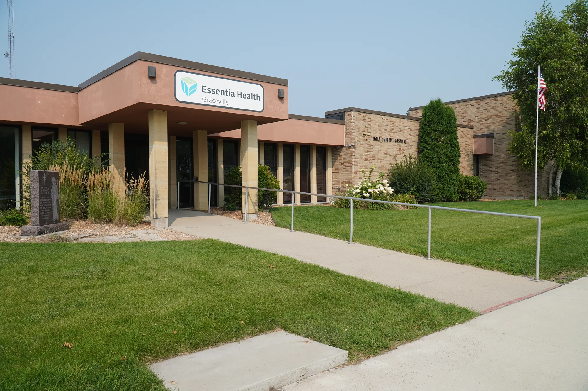 A group of doctors walking down a hallway.