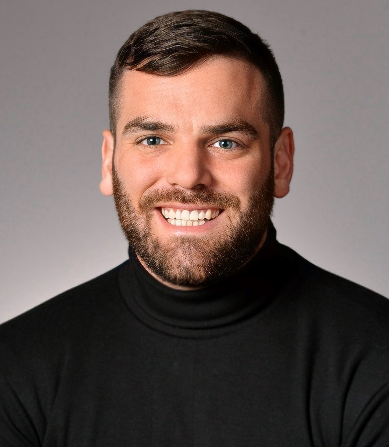 Tyler C.'s half-length photograph.