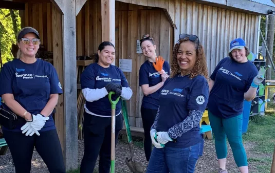 A group of students are laughing together