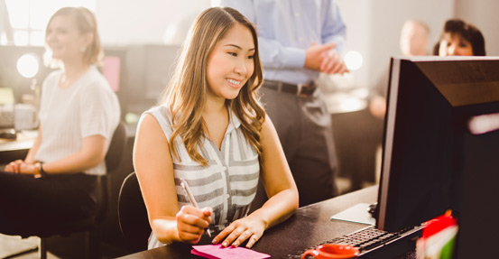 Office employee sitting at desk